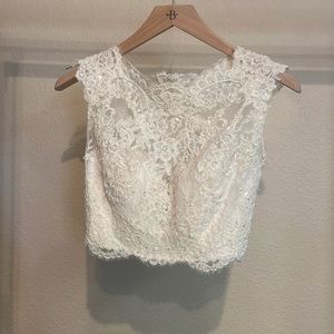 Never worn. Bridal crop top. Very good condition and very pretty.